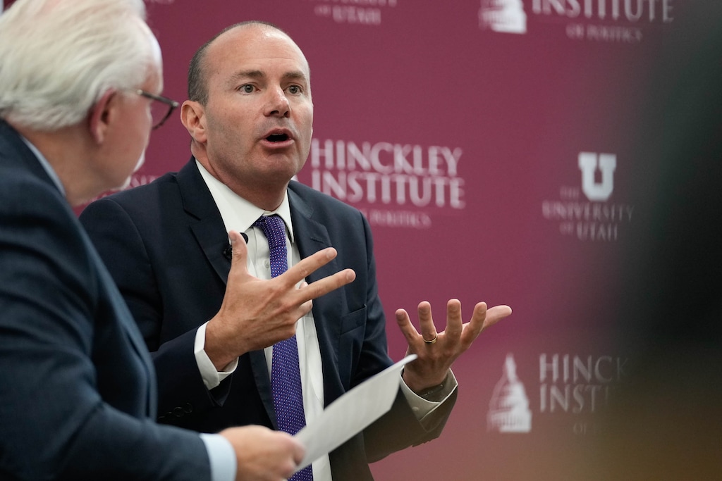 (Francisco Kjolseth | The Salt Lake Tribune) Utah Sen. Mike Lee, right, joins Rick Larsen, President and CEO of the Sutherland Institute during a speaking engagement at the conservative public policy think tank on the University of Utah campus on Tuesday, Aug. 22, 2023. Lee recently walked back a conspiracy theory he promoted about the January 6 riot.