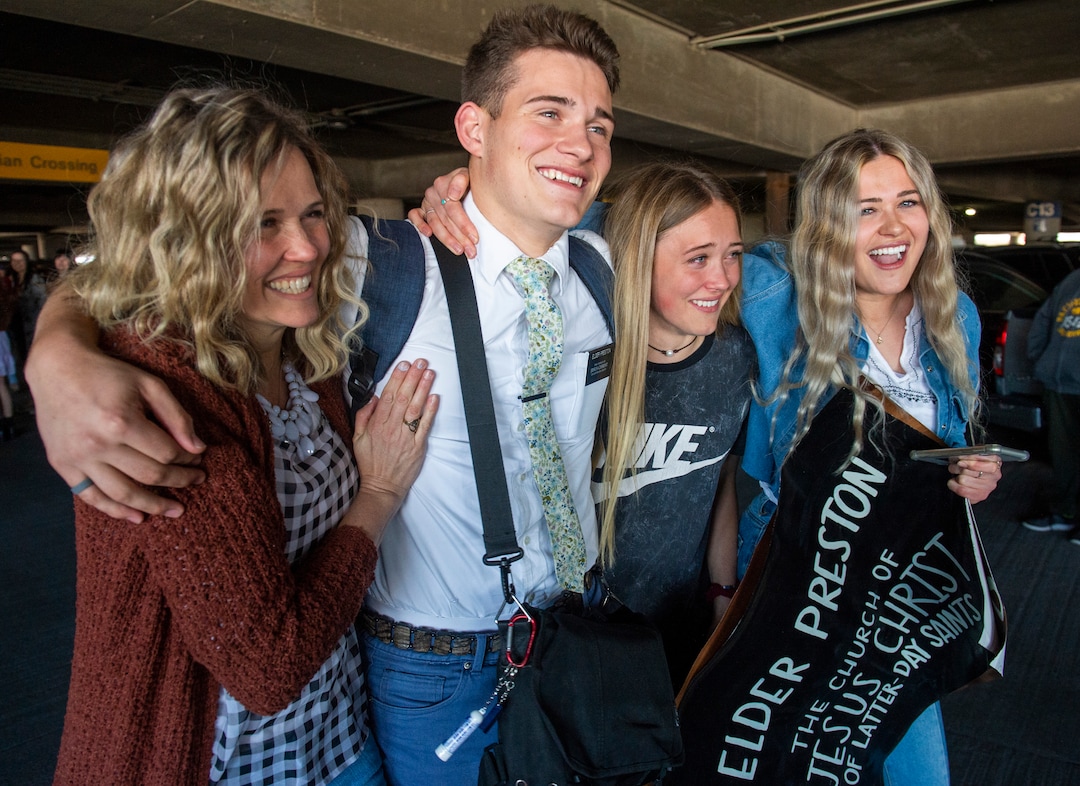(Rick Egan  |  The Salt Lake Tribune)      The Preston family, from Kaysville, welcomes home Elder Kaleb Preston, from his mission in the Philippines, at the Salt Lake City International Airport, Sunday, March 22, 2020.