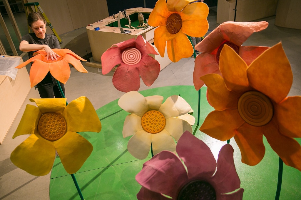 (Photo courtesy of Natural History Museum of Utah) A staffer at the Natural History Museum of Utah works on a giant flower patch, part of the new exhibition "Nature All Around Us," which opens Oct. 19, 2019, at the museum, at 301 Wakara Way, Salt Lake City.