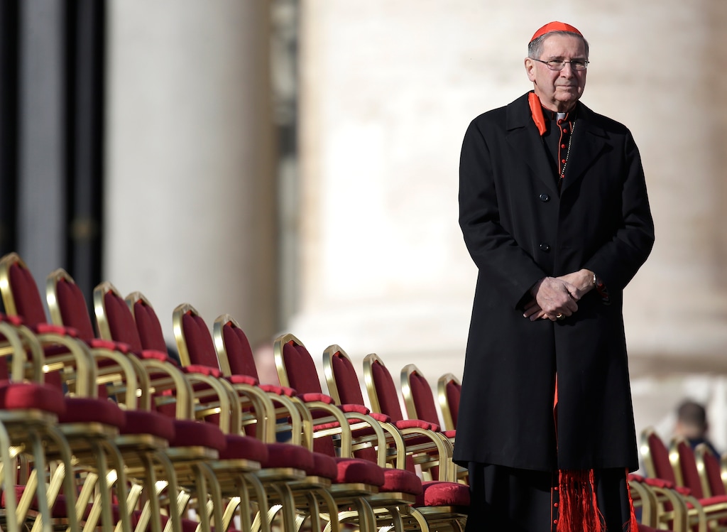 (AP Photo/Gregorio Borgia) Cardinal Roger Mahony stands next to a row of chairs in St. Peter's Square at the Vatican, Wednesday, Feb. 27, 2013.