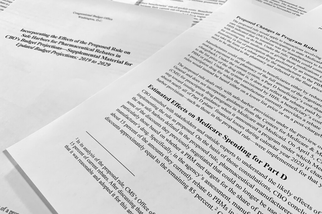 (Jon Elswick | Associated Press file photo) A report released on Thursday, May 2, 2019, by the Congressional Budget Office is photographed in Washington. Budget experts for Congress say the Trump administration’s plan to reduce out-of-pocket drug costs for Medicare beneficiaries will cost taxpayers another $177 billion from 2020-2029.
