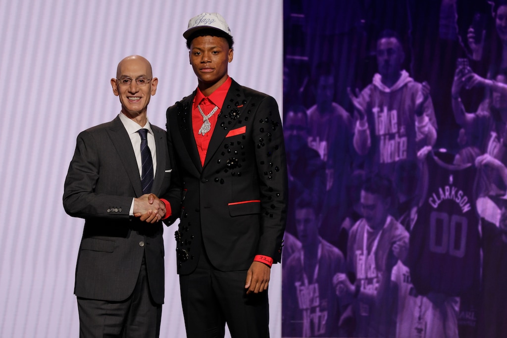Ace Bailey poses for a photo with NBA commissioner Adam Silver after being selected fifth by the Utah Jazz in the first round of the NBA basketball draft, Wednesday, June 25, 2025, in New York. (AP Photo/Adam Hunger)