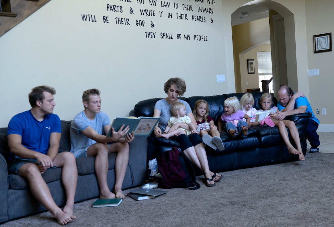 (Al Hartmann  |  The Salt Lake Tribune)
Believers in Denver Snuffer's Remnant movement meet in a Sandy home Sunday, Aug. 13, to sing hymns and take the sacrament.