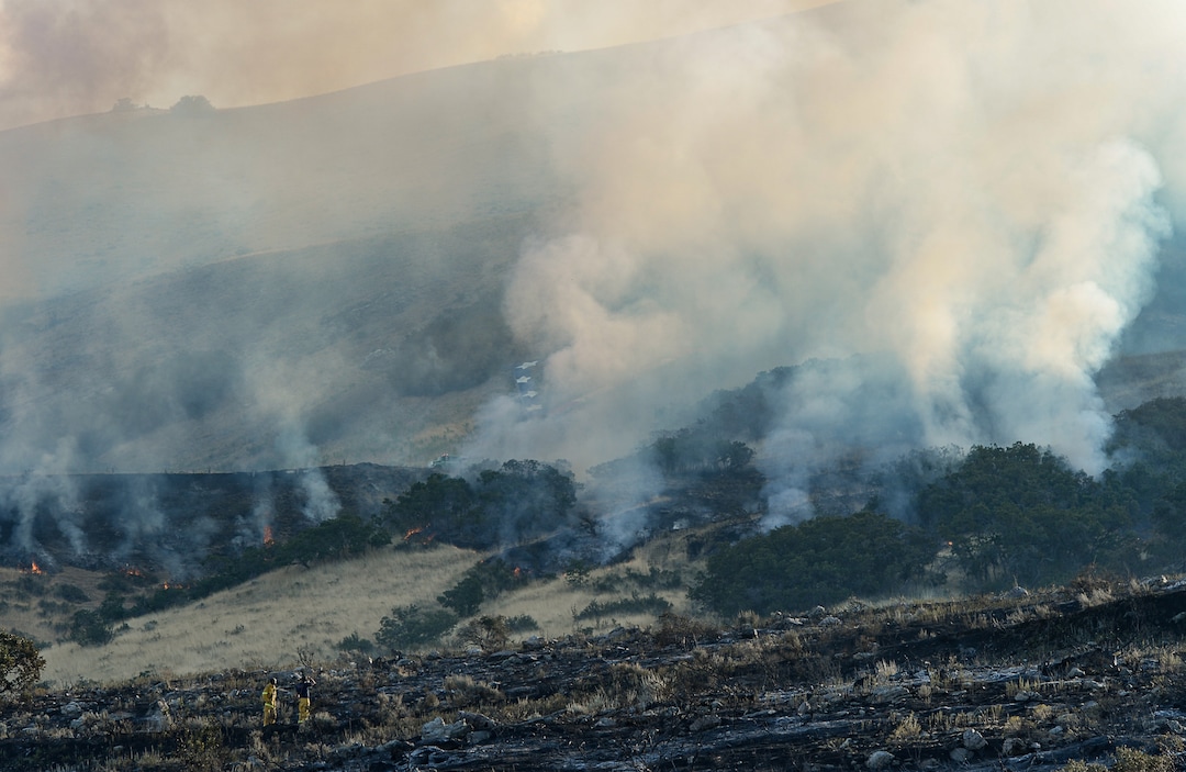 (Francisco Kjolseth  |  The Salt Lake Tribune)  Fire crews battle a fire in Davis County in Utah on the East Bountiful bench that grew to 150 acres early Friday morning, Aug. 30, 2019, and destroyed three homes. On Sept. 2, officials said the fire was 100% contained.