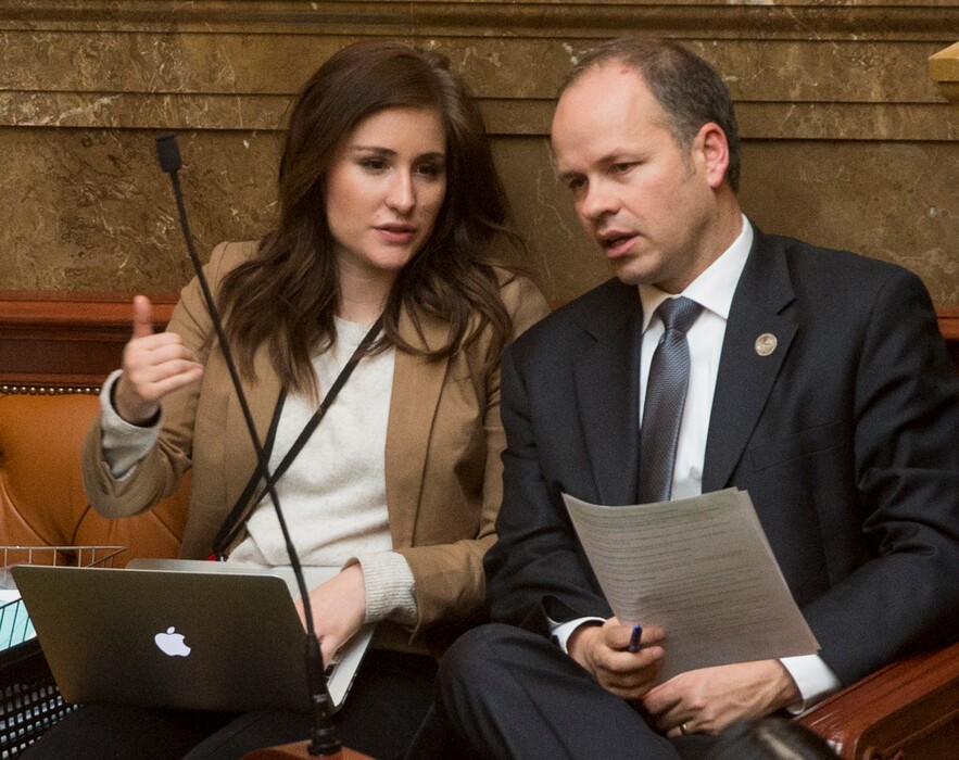 (Rick Egan  |  The Salt Lake Tribune)   Rep. Tim Hawkes talks with his intern Paige Walton, in the Utah House of Representatives, Friday, March 2, 2018.