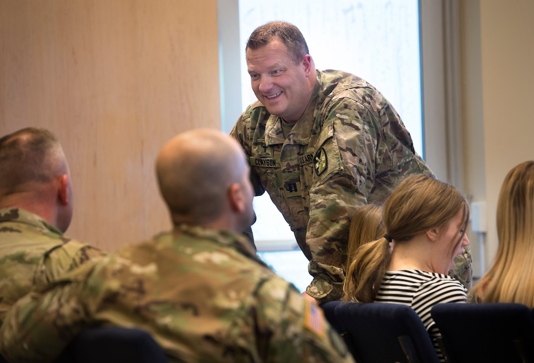 Scott Sommerdorf | The Salt Lake TribuneChaplain Captain Tim Clayson speaks with servicemen prior to an LDS service at the Camp Williams chapel, Sunday, March 4, 2018.