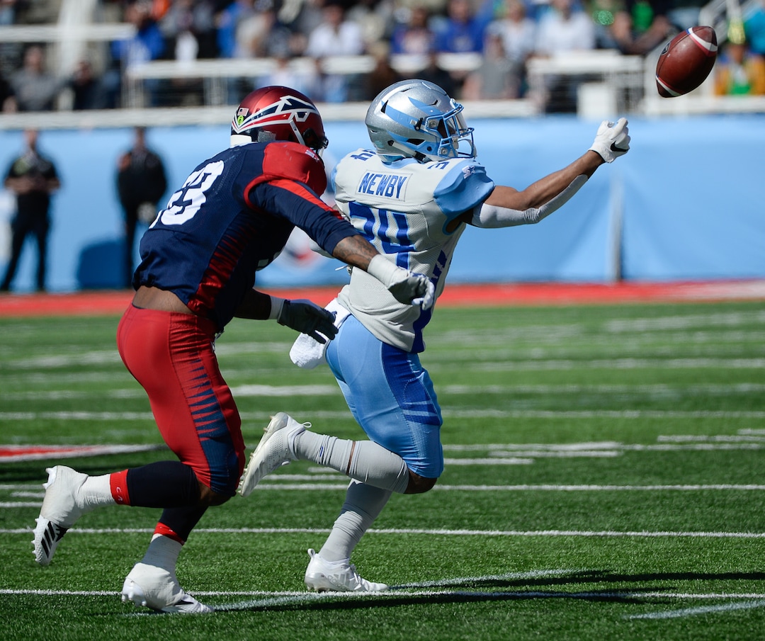(Francisco Kjolseth  |  The Salt Lake Tribune)  Drew Jackson #53 of the Memphis Express pressures Terrell Newby #34 of the Salt Lake Stallions as the Stallions host the Memphis Express of the Alliance of American Football in Salt Lake City on Saturday March 16, 2019.