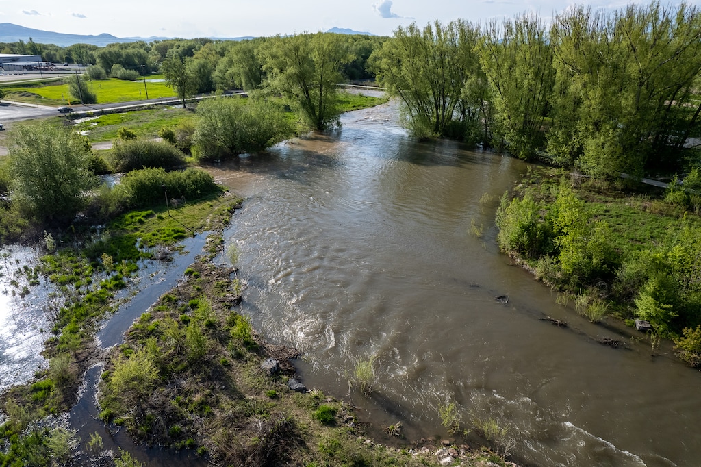 (Trent Nelson  |  The Salt Lake Tribune) The Logan River runs high through Rendezvous Park on Thursday, May 18, 2023.