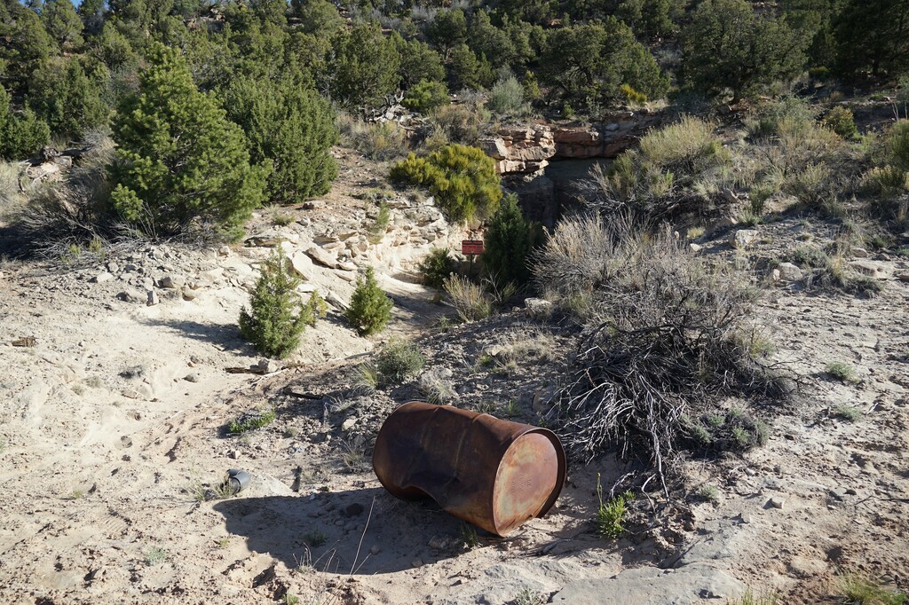 (Zak Podmore | The Salt Lake Tribune) Trash outside the abandoned None Such uranium mine in San Juan County, June 14, 2021. Radon occurs naturally in the presence of radioactive elements, such as uranium and radium.