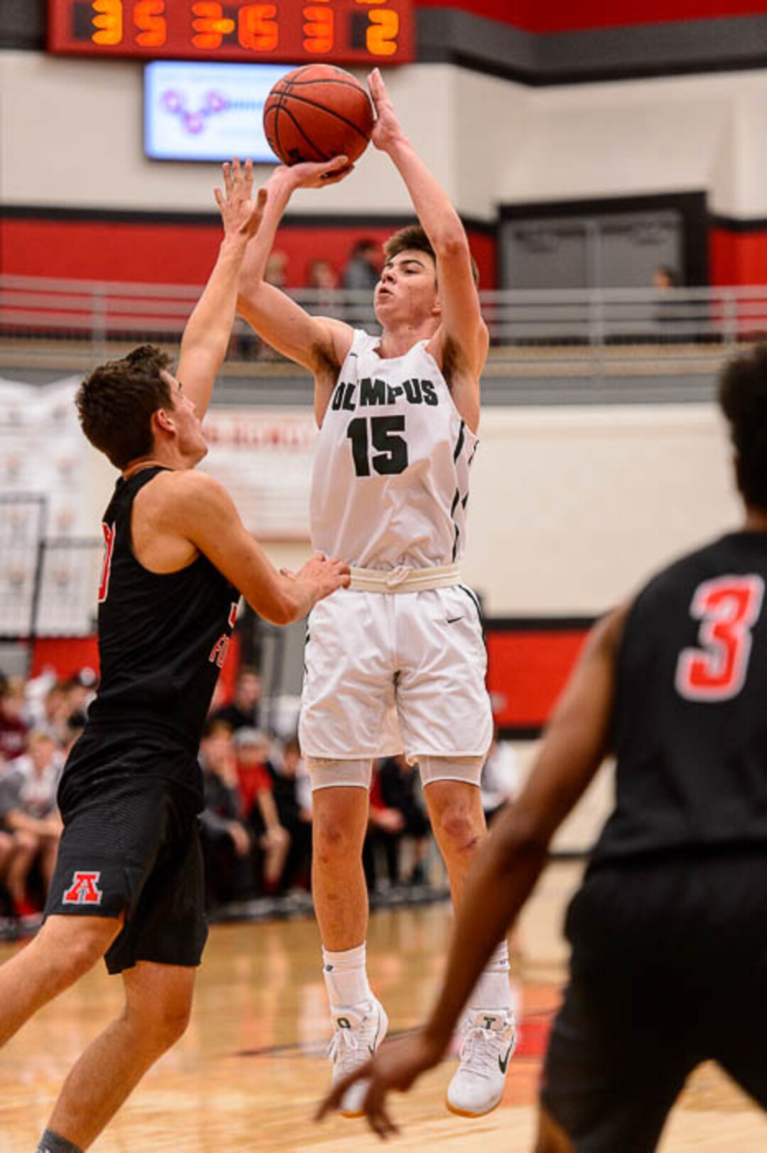 (Trent Nelson | The Salt Lake Tribune)  Olympus's Rylan Jones shoots as American Fork hosts Olympus in the Utah Elite Eight tournament, Saturday December 9, 2017.