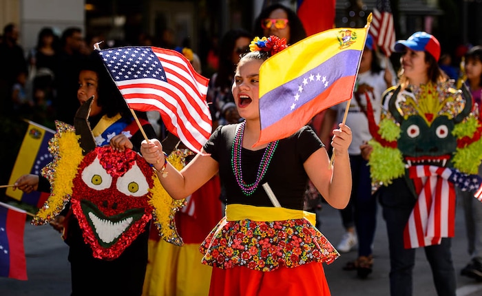 (Trent Nelson | The Salt Lake Tribune)
A group calling attention to the situation in Venezuela march in the third annual Hispanic Heritage Parade and Street Festival in Salt Lake City, Saturday Sept. 22, 2018.