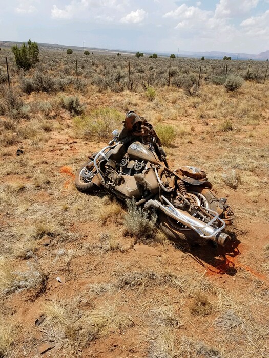 (photo courtesy Utah Highway Patrol) A motorcycle sits damaged after a crash Thursday on U.S. 89 east of Kanab. Two motorcyclists in a group of eight were killed in the crash, and two more were injured.