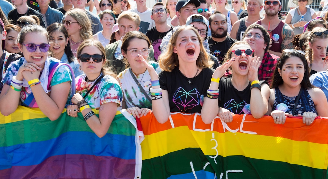 (Rick Egan  |  The Salt Lake Tribune)     Fans cheer as Tyler Glenn performs at the Loveloud Festival at Rice-Eccles Stadium, Saturday, July 28, 2018.
