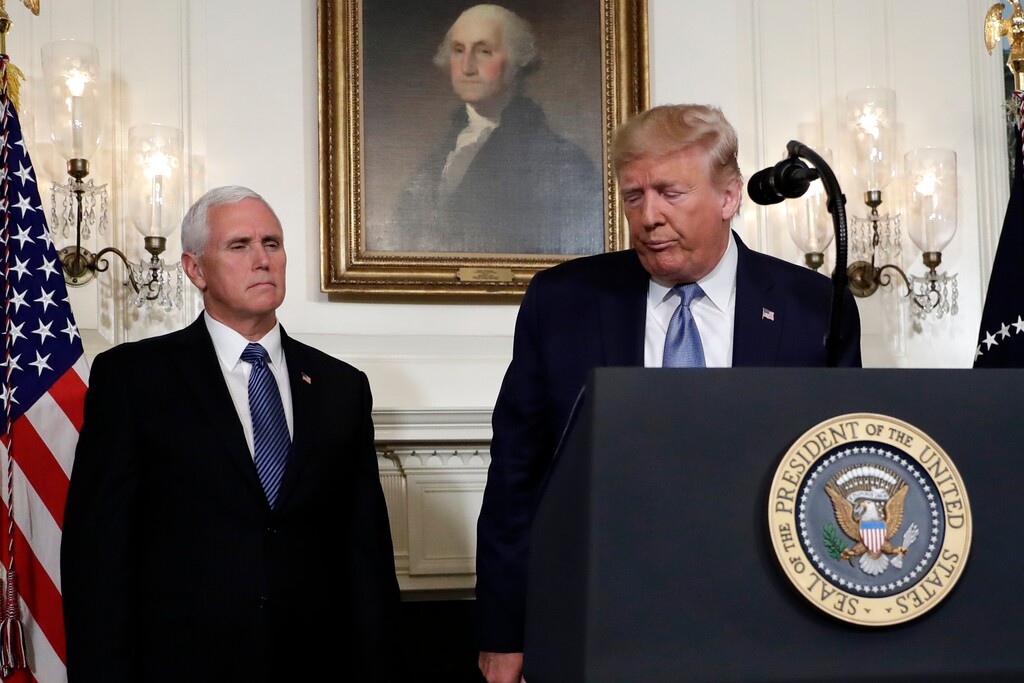 (Evan Vucci | AP file photo) President Donald Trump walks away after speaking about the mass shootings in El Paso, Texas and Dayton, Ohio, in the Diplomatic Reception Room of the White House, Monday, Aug. 5, 2019, in Washington. Vice President Mike Pence is left.
