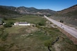 (Bethany Baker | The Salt Lake Tribune) The McLeod Creek flows beside Utah State Route 224 within the Weber River watershed near Snyderville on Thursday, June 11, 2026.