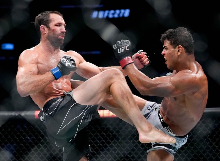 (Francisco Kjolseth | The Salt Lake Tribune) No. 6 ranked middleweight Paulo Costa of Brazil, right, faces former middleweight champion Luke Rockhold of the United States during their UFC 278 mixed martial arts bout in the octagon at Vivint Arena in Salt Lake City on Saturday, Aug. 20, 2022. 