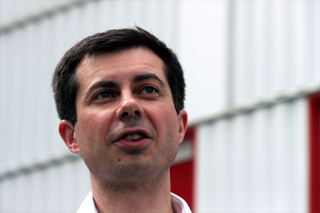 (AP Photo/Charles Krupa, File) In this April 19, 2019, file photo, Democratic presidential candidate South Bend Mayor Pete Buttigieg during a campaign stop at a dairy company in Londonderry, N.H.