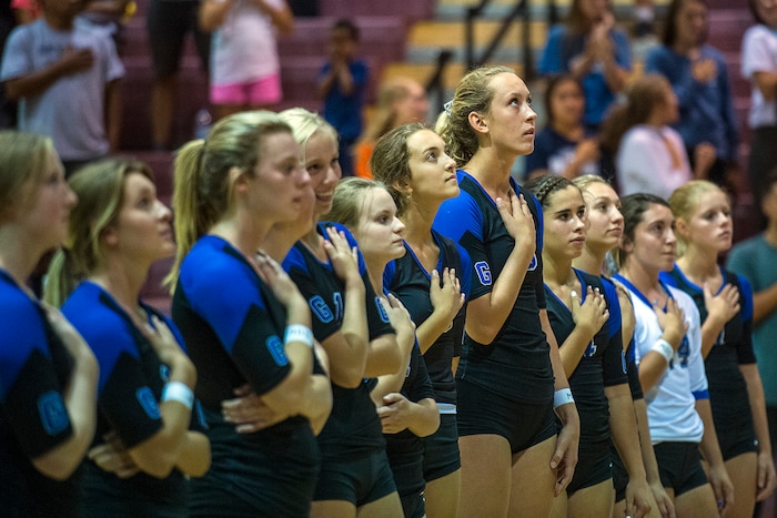 (Chris Detrick  |  The Salt Lake Tribune)  Pleasant Grove's Heather Gneiting (5) listens to the National Anthem before the volleyball match at Lone Peak High School Tuesday, September 5, 2017. 