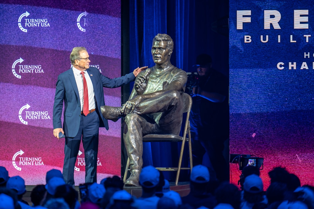 (Trent Nelson  |  The Salt Lake Tribune) Frank Turek stands next to a sculpture of Charlie Kirk, unveiled at a memorial event marking one year since Charlie Kirk’s killing at Utah Valley University in Orem on Thursday, Sept. 10, 2026.