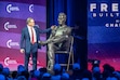 (Trent Nelson | The Salt Lake Tribune) Frank Turek stands next to a sculpture of Charlie Kirk, unveiled at a memorial event marking one year since Charlie Kirk’s killing at Utah Valley University in Orem on Thursday, Sept. 10, 2026.