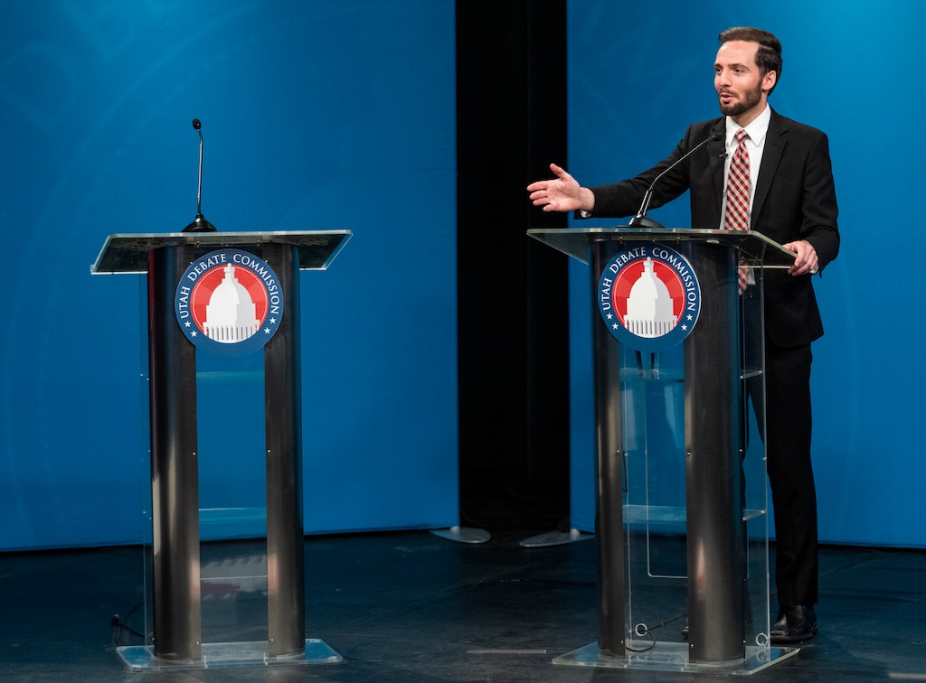 (Rick Egan | The Salt Lake Tribune) Jake Hunsaker answers questions next to an empty podium during a debate in the 4th Congressional District GOP primary after his opponent, Rep. Burgess Owens, declined to participate, on Wednesday, June 1, 2022. Hunsaker is now running for a seat in the Utah House of Representatives.