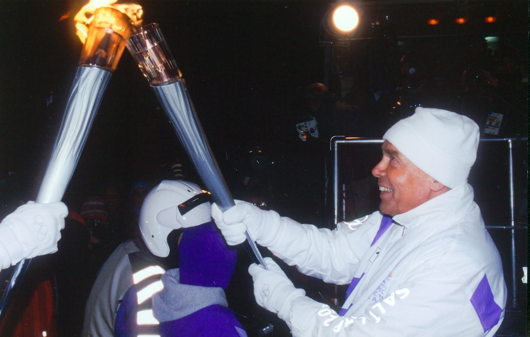(photo courtesy Huntsman family) Jon Huntsman participates in the Olympic Torch relay in 2002.