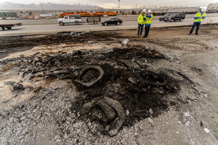 (Trent Nelson | The Salt Lake Tribune)  Charred debris at the scene of a tanker fire at 7200 South I-15, Friday January 19, 2018.