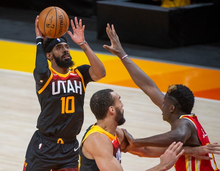 (Rick Egan | The Salt Lake Tribune) Utah guard Mike Conley (10) shoots for the Jazz, in NBA action between the Utah Jazz and the Atlanta Hawks at Vivint Arena, on Friday, Jan. 15, 2021.