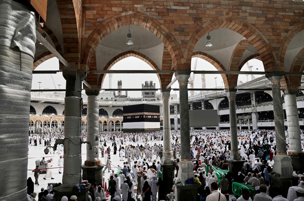 Muslim pilgrims arrive to circle the Kaaba, Islam's holiest shrine, at the Grand Mosque in the Muslim holy city of Mecca, Saudi Arabia, Thursday, Sept. 8, 2016. Muslim pilgrims have begun arriving at the holiest sites in Islam ahead of the annual hajj pilgrimage in Saudi Arabia, with some weeping with their hands outstretched for a fleeting touch of the Kaaba. The cube-shaped shrine, at the center of Mecca's Grand Mosque, is the site the world’s 1.6 billion Muslims pray toward five times a day. (AP Photo/Nariman El-Mofty).