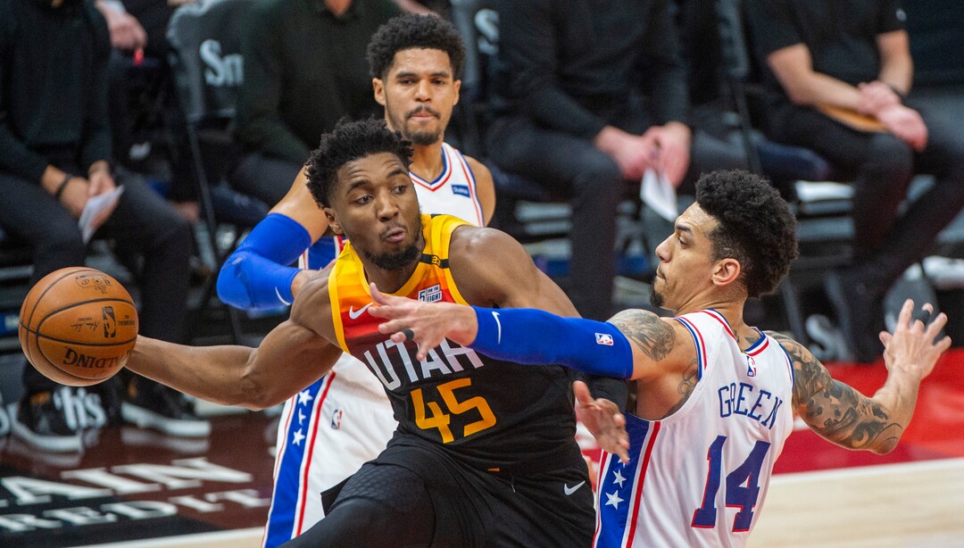 (Rick Egan | The Salt Lake Tribune)  Utah Jazz guard Donovan Mitchell (45) fires a pass out to Utah Jazz guard Jordan Clarkson (00) for a 3 pointer, in NBA action between the Utah Jazz and the Philadelphia 76ers at Vivint Arena, onMonday, Feb. 15, 2021.