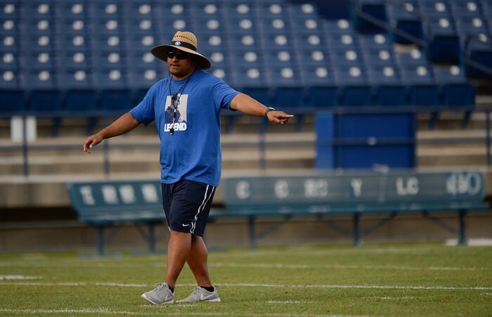 (Francisco Kjolseth  |  The Salt Lake Tribune)  BYU head coach Kalani Sitake keeps an eye on the game as they hold a scrimmage at LaVell Edwards Stadium in Provo on Thursday, Aug. 10, 2017.
