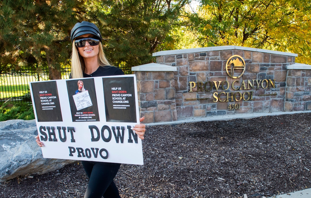 (Rick Egan  |  The Salt Lake Tribune)    Paris Hilton leads a group of protesters past the Provo Canyon School, during a rally and march calling  for the closure of Provo Canyon School, a residential treatment center in Utah she attended when she was a teen, on Friday, Oct. 9, 2020.