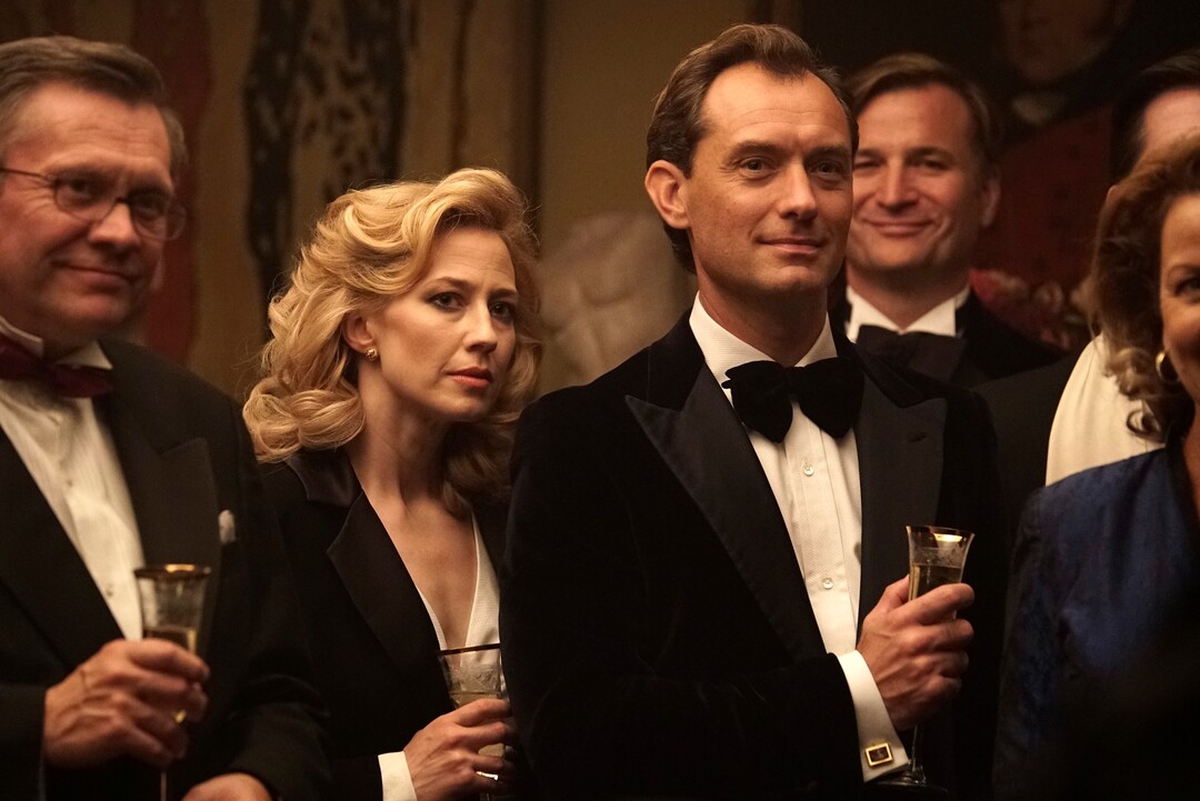 This image released by IFC Films shows Jude Law, center right, and Carrie Coon, center left, in a scene from "The Nest." (IFC Films via AP)