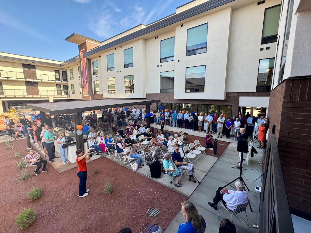 (Mark Eddington | The Salt Lake Tribune) People gather for the opening of Switchpoint Red Hills, St. George's first permanent housing development for people experiencing homelessness and housing insecurity, on Thursday, Aug. 13, 2026.