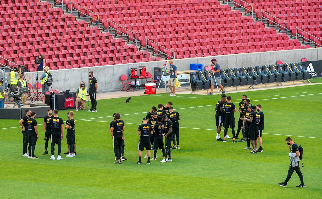 (Rick Egan  |  The Salt Lake Tribune)     Players mingle on the field wearing Black Lives Matter shirts, in the empty stadium as the game between Real Salt Lake and LAFC was postponed after teams in sports leagues across the country boycotted scheduled games to protest the police shooting of Jacob Blake, RSL and LAFC followed suit, along with the rest of MLS, on Wednesday, Aug. 26, 2020.
