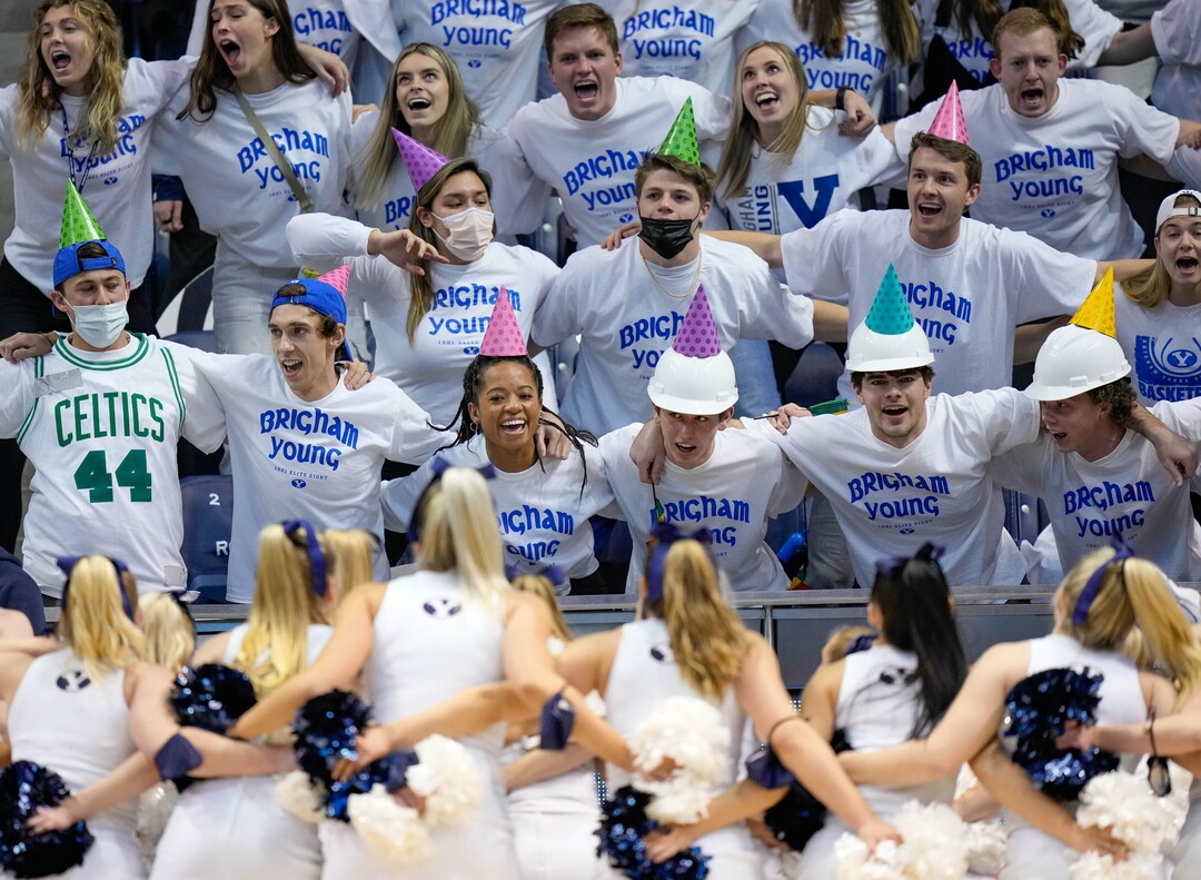 (Francisco Kjolseth | The Salt Lake Tribune) The BYU student section dresses up as ice cream cones in celebration of Brigham Young Cougars forward Fousseyni Traore (45) birthday in WCC basketball action between the Brigham Young Cougars and the Portland Pilots, at the Marriott Center, on Saturday, January 22, 2022.