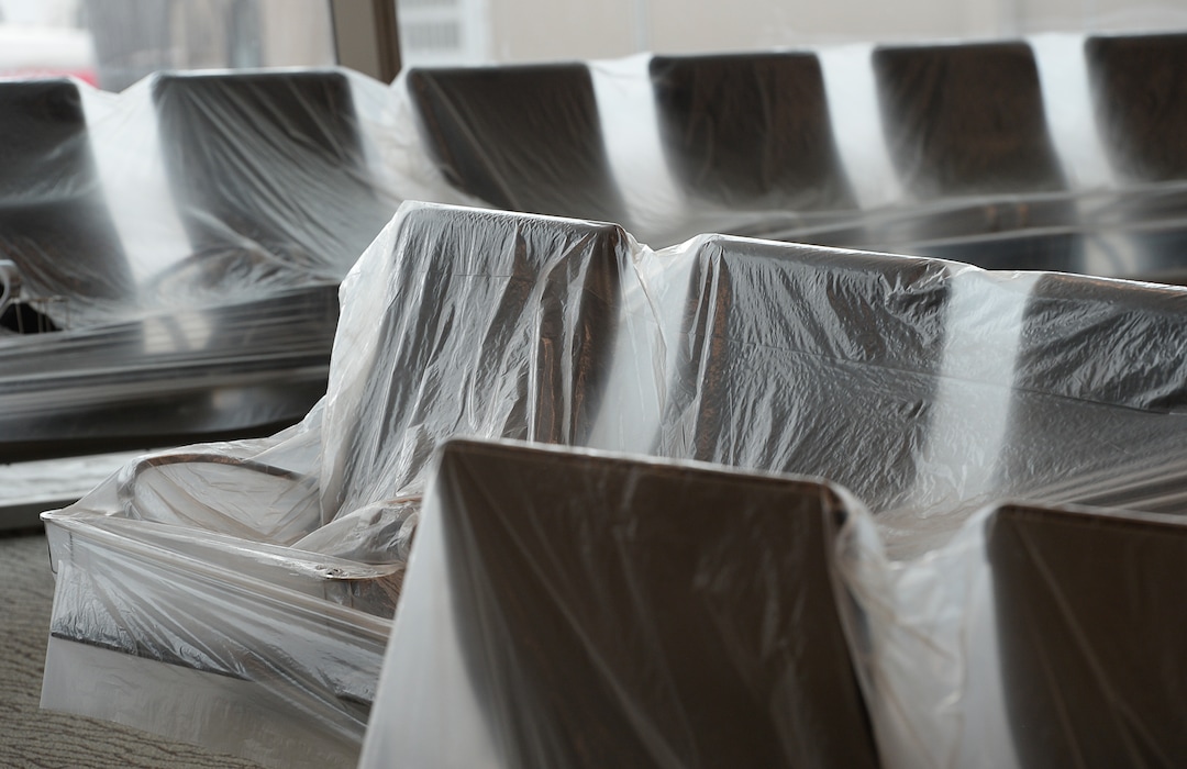 (Francisco Kjolseth  |  The Salt Lake Tribune) Chairs remain covered with plastic as crews continue their work in the first phase of construction of the Salt Lake City International Airport on Wednesday, May 20, 2020.