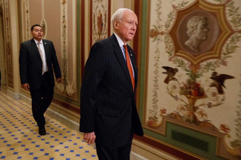 Senate Finance Committee Chairman Sen. Orrin Hatch, R-Utah walks to a meeting with Treasury Secretary-designate Steven Mnuchin, Thursday, Dec. 8, 2016, on Capitol Hill in Washington. (AP Photo/Evan Vucci)