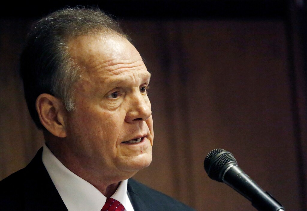 FILE - In this Jan. 17, 2014 file photo, Chief Justice Roy Moore of the Alabama Supreme Court addresses a Pro-Life Mississippi and a Pastors for Life luncheon in Jackson, Miss. Alabama began issuing marriage licenses to same-sex couples Monday, Feb. 9, 2015, despite an 11th-hour attempt from Moore  an outspoken opponent  to block the weddings. (AP Photo/Rogelio V. Solis, File)