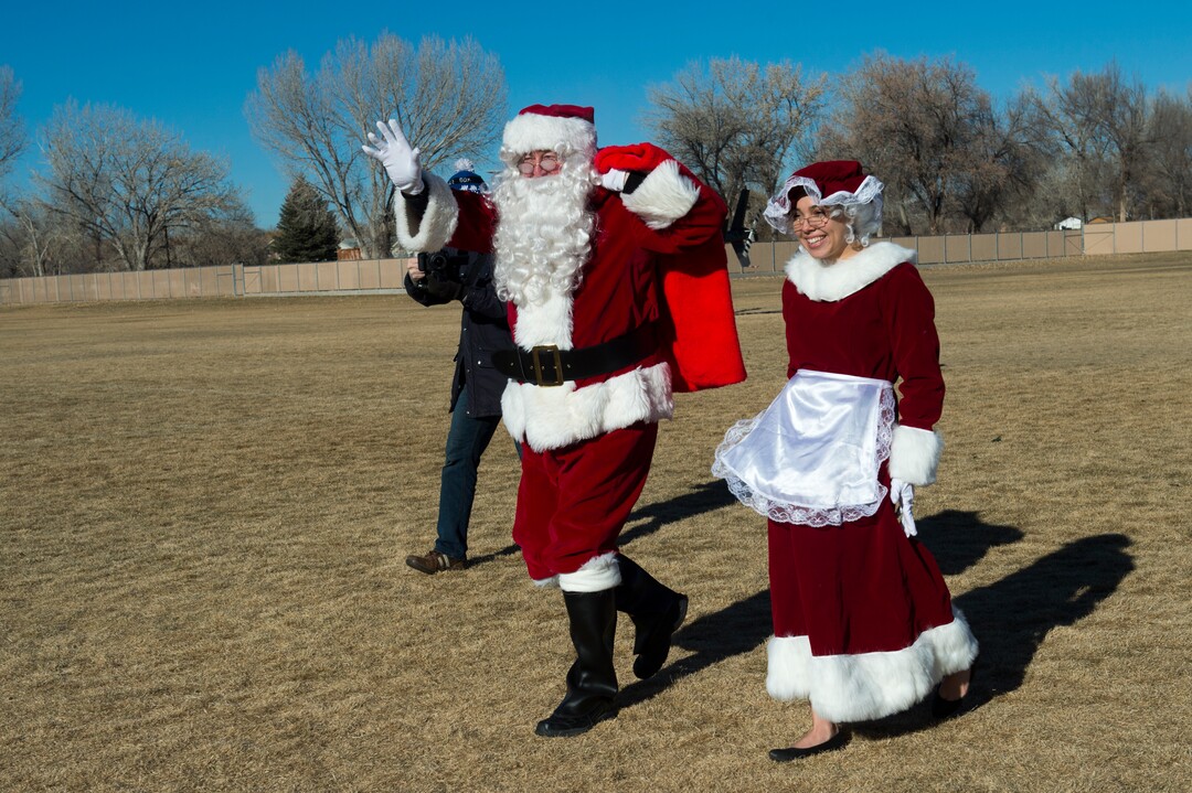 (Rick Egan  |  The Salt Lake Tribune) Santa and Mrs Claus greet students at Centennial Elementary School, in Roosevelt, Utah, as volunteer pilots from the Utah Wing of Angel Flight West,  brought school supplies and gifts to students in Roosevelt on their annual Santa Flight. Friday, December 8, 2017.