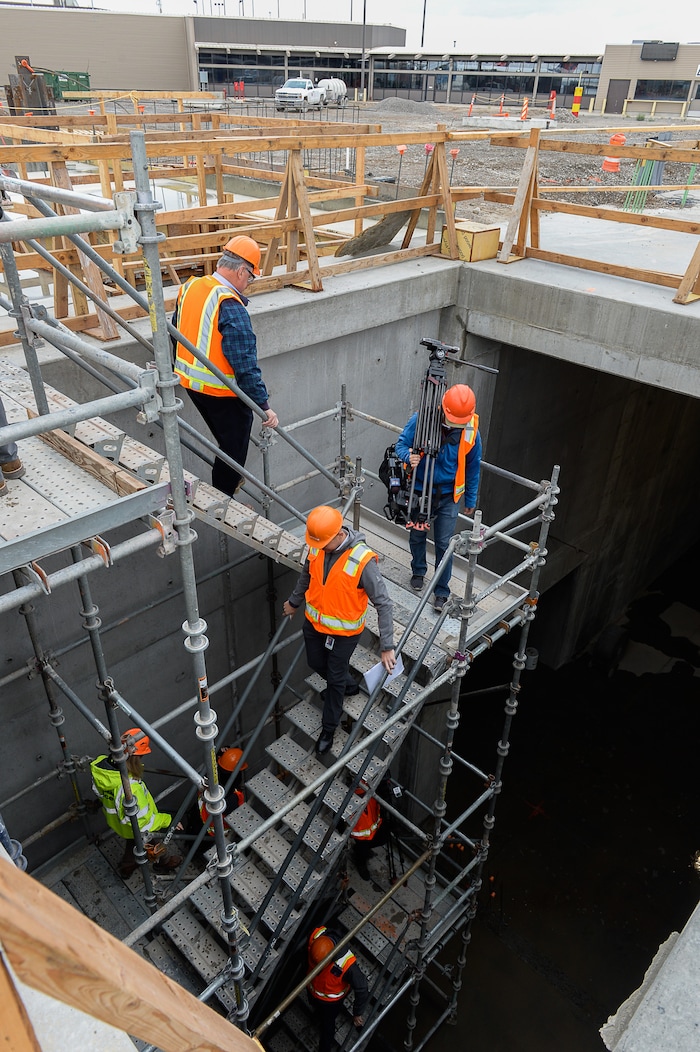 (Francisco Kjolseth  |  The Salt Lake Tribune)  The Salt Lake City Department of Airports gives a tour of the progress being made to replace the three aging terminals with a single central terminal building. Over time, the existing terminal, parking garage and concourses will be completely demolished and replaced with an estimated completion date of 2025.