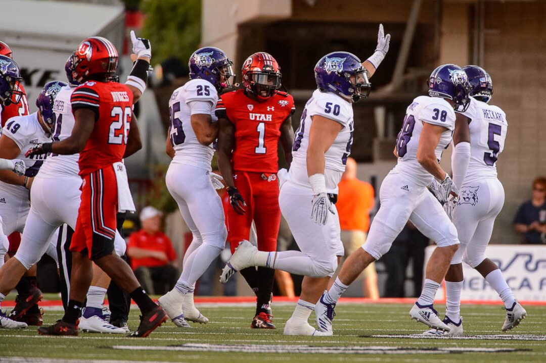 (Trent Nelson | The Salt Lake Tribune)  Weber players celebrate a turnover as the University of Utah Utes host the Weber State Wildcats, Thursday Aug. 30, 2018 at Rice-Eccles Stadium in Salt Lake City.