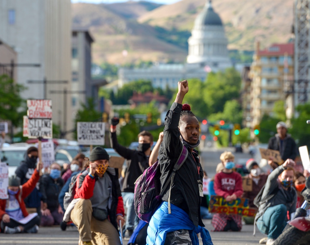 (Leah Hogsten  |  The Salt Lake Tribune) Demonstrators with Black Lives Matter marched from the Utah Capitol down State Street, stopping at every intersection for five minutes in honor of George Floyd, June 8, 2020.