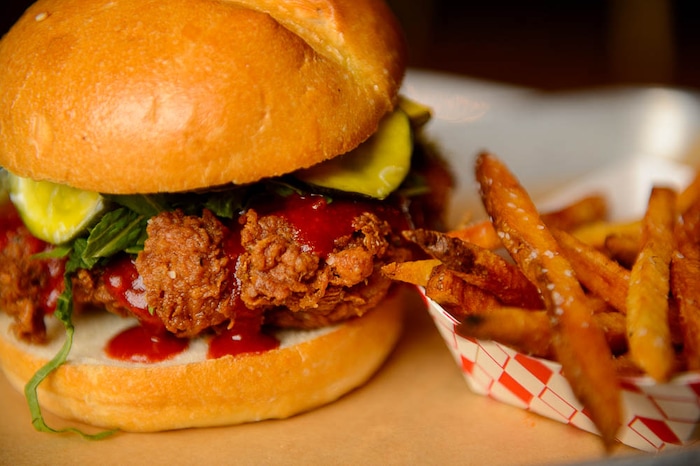 (Trent Nelson | The Salt Lake Tribune)  
Nomad Eatery, a new fast-casual restaurant near the airport in Salt Lake City. The chef/owner is Justin Soelberg, who worked at Avenues Proper and Proper Burger before launching this new eatery. Thursday March 22, 2018. Spicy chicken sandwich.