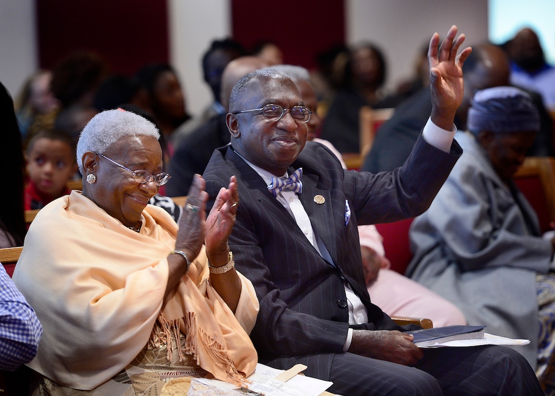 (Scott Sommerdorf  | Tribune) The Rev. France Davis, pastor of Salt Lake City's historic Calvary Baptist Church, reacts as he listens to guest pastor Dr. Robert E. Fowler's sermon, Sunday, April 24, 2016. Davis sits next to his wife Willene, left, as pastor Davis is marking his 42nd pastoral anniversary.