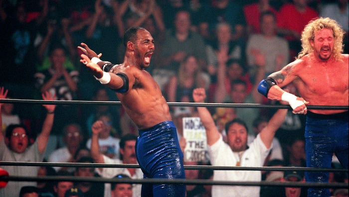 (Trent Nelson | The Salt Lake Tribune) Karl Malone and Diamond Dallas Page at WCW's Bash at the Beach in San Diego. July 12, 1998.
