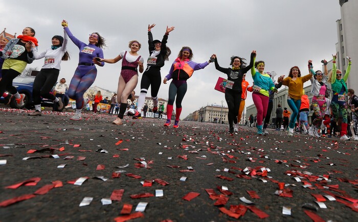 Participants take part in the women's 'Beauty Run' in Minsk, Belarus, Sunday, March 8, 2020. Five thousands participants took part in the event in connection with International Women's Day, which is an official holiday in Belarus. (AP Photo/Sergei Grits)