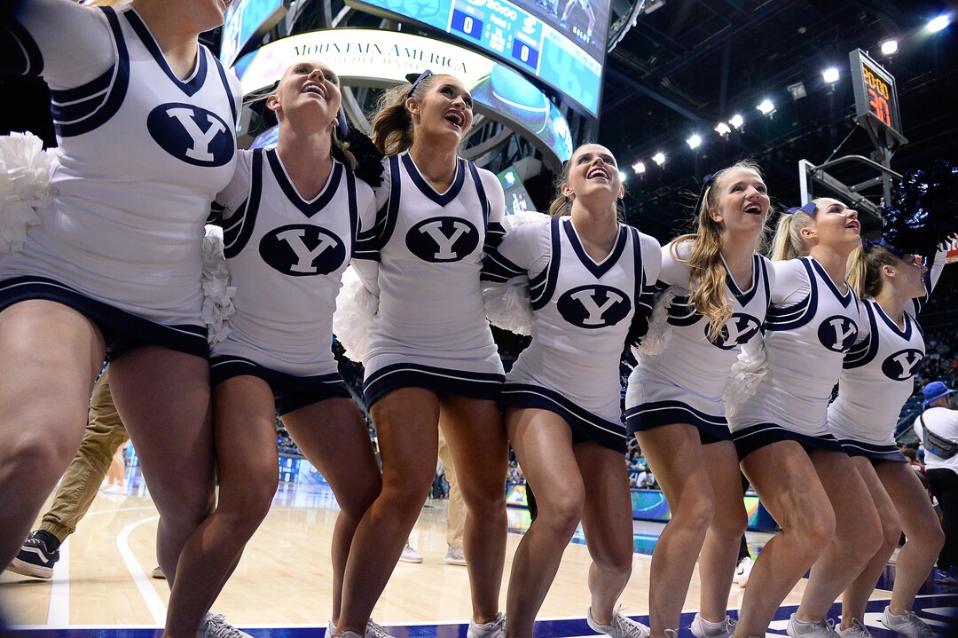 (Francisco Kjolseth  |  The Salt Lake Tribune) The BYU cheerleaders get the student section riled up before the start of the game against the Santa Clara Broncos at the Marriott Center in Provo, Thursday, Feb. 20, 2020. BYU won 85-75.