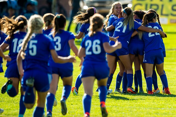 (Chris Detrick | The Salt Lake Tribune) Members of the Fremont soccer team celebrate after winning the game at Angel Street Soccer Complex in Kaysville Thursday, August 24, 2017. Fremont defeated Davis 5-4 in double overtime.