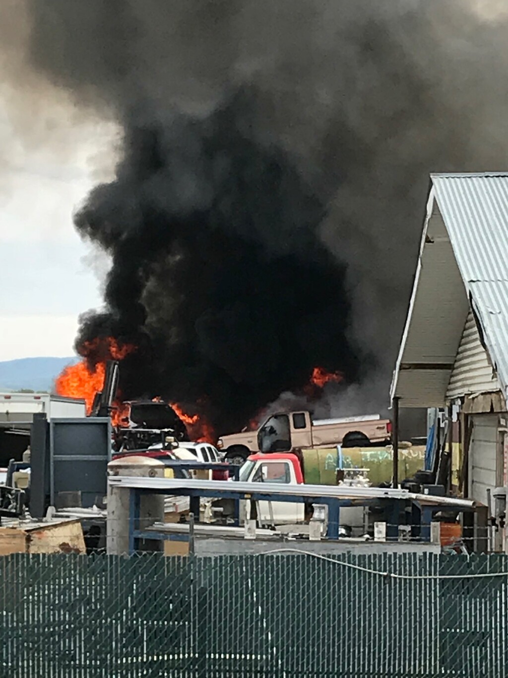 (Courtesy of Logan City Fire Department) A large fire that started at DD Auto & Salvage in Logan on Saturday, May 5, 2018, shut down State Route 30, otherwise known as Valley View Highway.